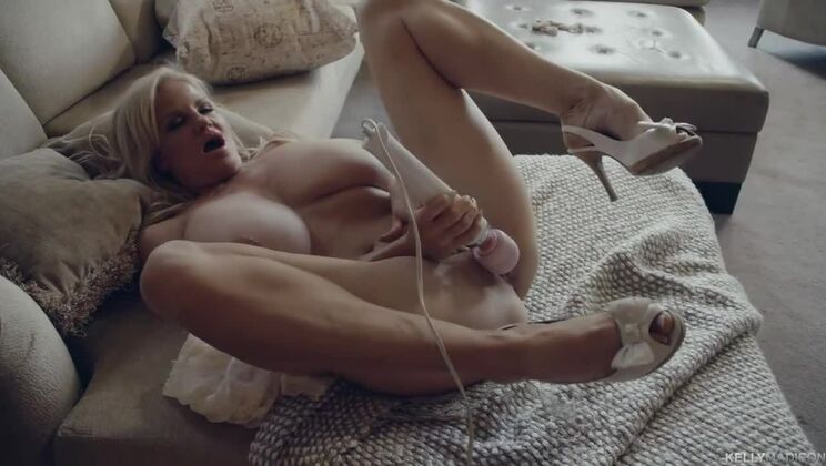 Kelly Madison Gets Vibrant with Her Toys